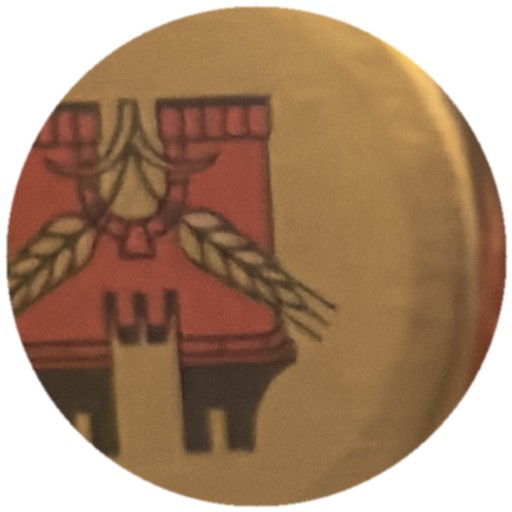 Château rouge et houblons sur doré