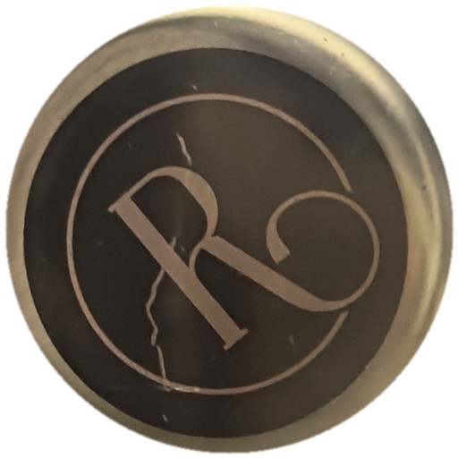 Lettre R dans cercle sur noir