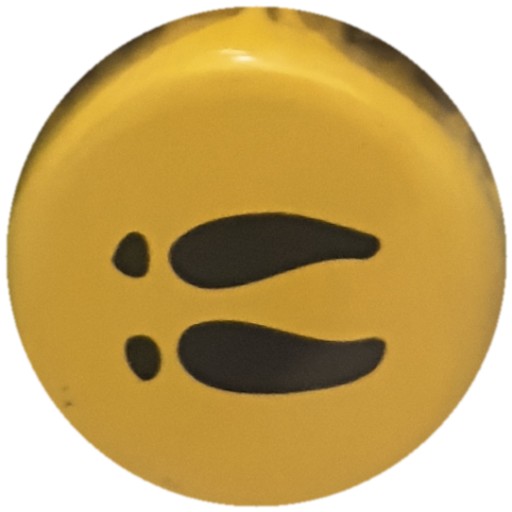 Empreintes noires sur jaune
